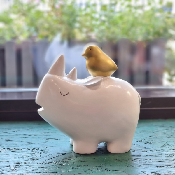 Статуэтка носорог и пеночка